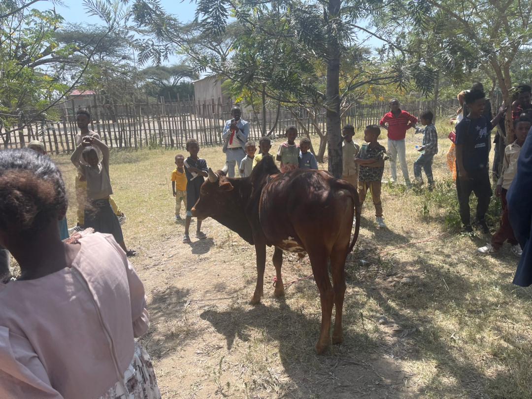 Groundbreaking ceremony with community leaders and donors celebrating the official start of the EEUM Multipurpose Building project